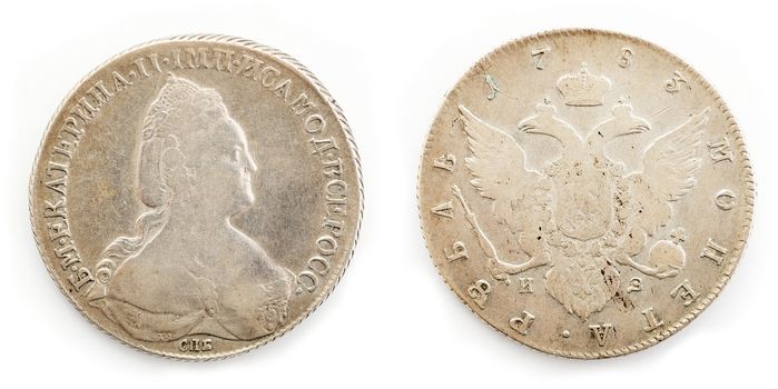 Old coin isolated on the white background