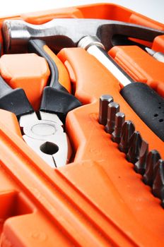 toolbox kit with hammer and screwdriver showing construction concept