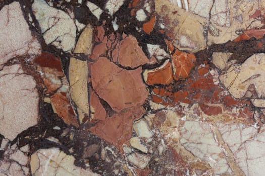 multicolor (pink, red, orange, brown)  natural marble stone texture from a polished tile