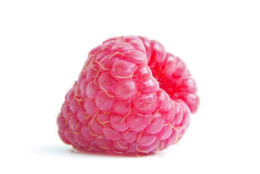 Ripe raspberry on a white background