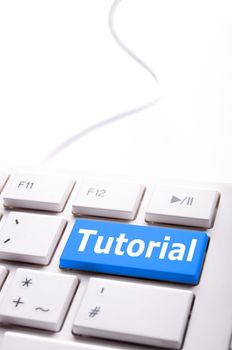 tutorial key with word showing internet or online software education concept