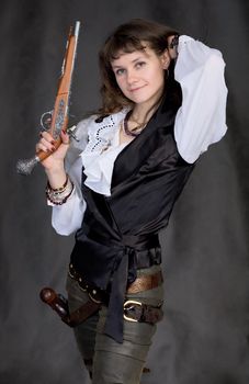 Girl - pirate with two pistols on black background