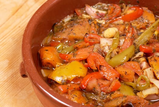 Traditional Spanish vegetable stew, pisto, served in a clay pot