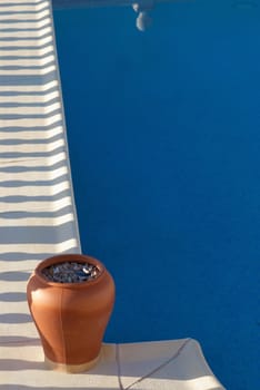 Detail take of  a swimming pool with the reflection of its balustrade