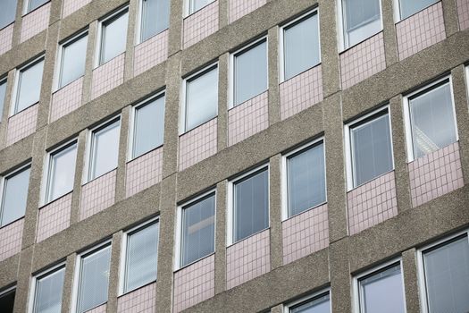 Several windows on a worn Building