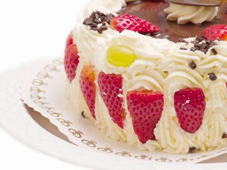 Delicious layer cake with strawberries and  cream