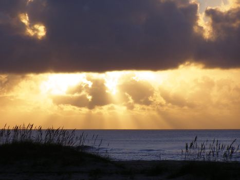Golden sunbeams on the blue Atlantic