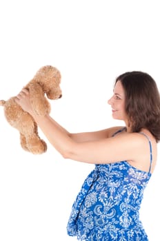 Portrait of pretty pregnant woman with toy bear isolated on white