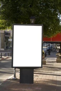 white ad blank on a city street