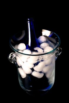 Crystal ice bucket with blue champagne bottle
