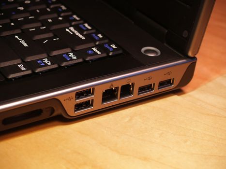 Closeup view of the side of a laptop computer with the focus on the ports