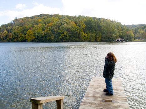 Young photographer captures mountain scene