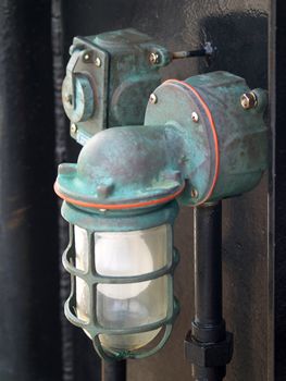 Lantern on a passenger ferry with a green patina