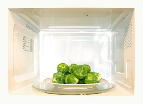 Microwave oven with Brussel sprouts