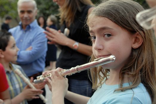 Margie play the flute