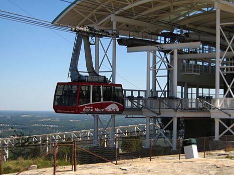 A photograph of a cable car in action.