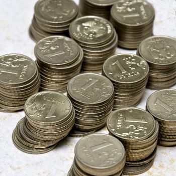 Real russian coins on table several stacks