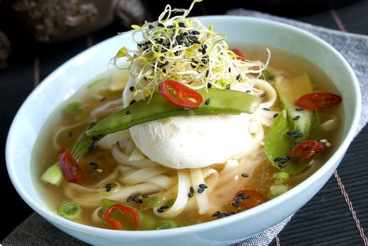 Chinese broth with poached egg