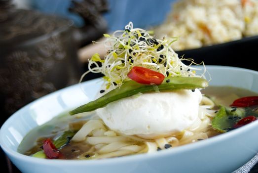 Chinese broth with poached egg