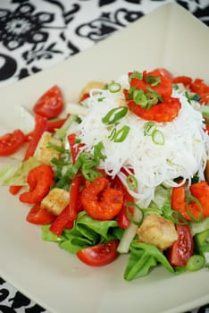 Delicious spicy prawn salad with rice noodles