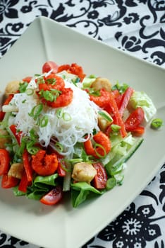 Delicious spicy prawn salad with rice noodles