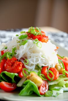 Delicious spicy prawn salad with rice noodles