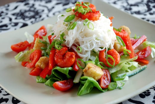 Delicious spicy prawn salad with rice noodles