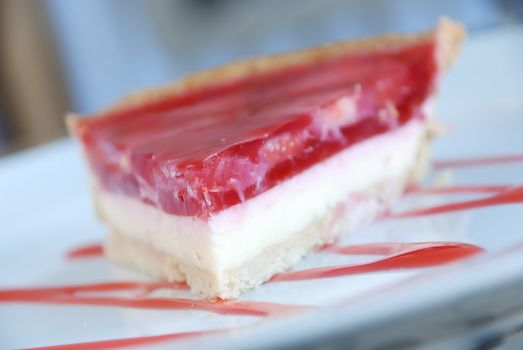 Strawberry tart with cream cheese and raspberry jelly