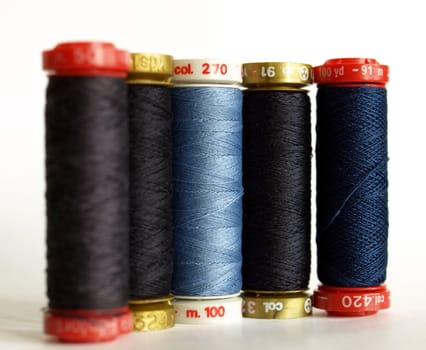 Blue sewing threads spools