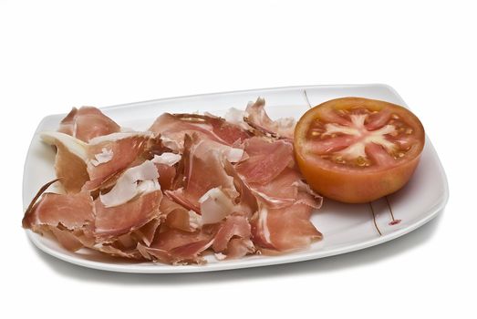 A plate of ham isolated on a white background.