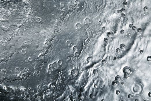 An abstract background in the form sheet metal with drops