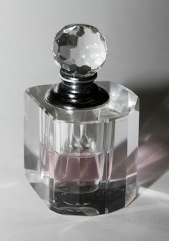 Bottle for perfumery with patches of light