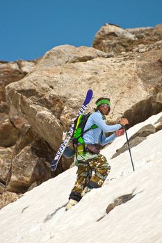 Freerider climbing a mountain, Caucasus, Elbrus, summer