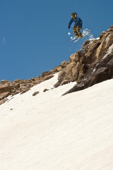 Freerider jumping in a mountains, Caucasus, Elbrus, summer