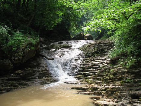 Falls; the river; a stream; water; a moisture; beauty; Caucasus; Russia; the Europe; a relief; a landscape; the nature