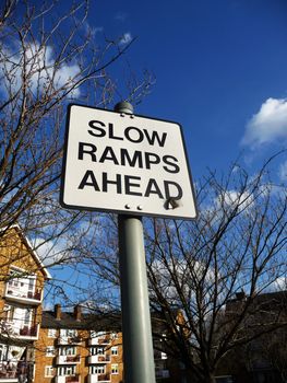 A slow ramp warning sign.