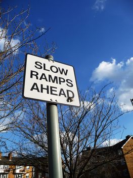 A slow ramp warning sign.