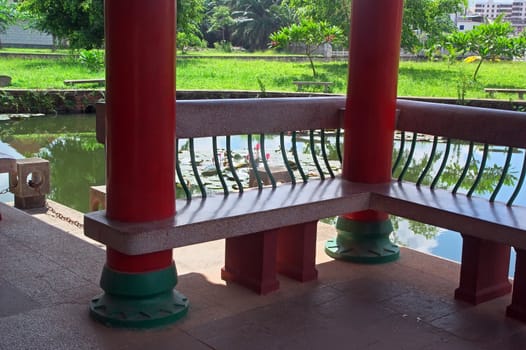 Chinese temples which usually have a pond, planted with water lilies in the pond