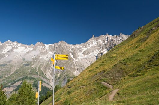 hiking in Ferret valley near Courmayeur, Aosta valley, Italy