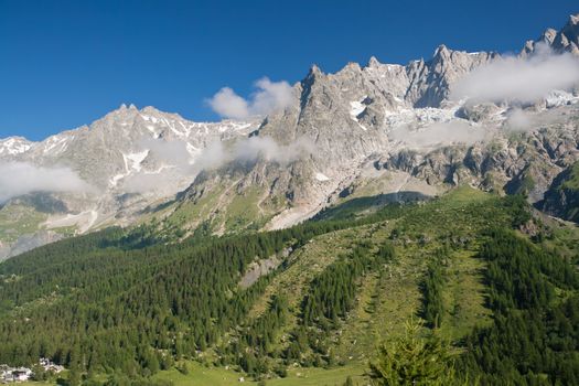 summer view of Ferret Valley and mont Blanc, Courmayeur, Italy. Photo taken with polarized filter