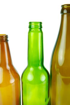 Empty beer bottles isolated against a white background