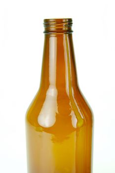 Empty beer bottles isolated against a white background
