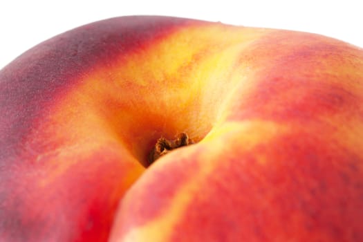 Macro view of tasty juicy peache on a white background