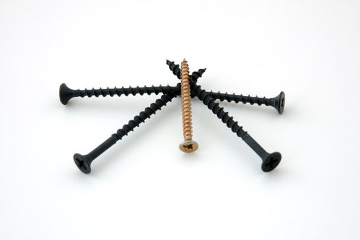 Five screws - four black screws and one gold metallic.