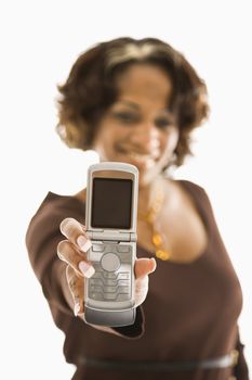 Woman holding out open cellphone.