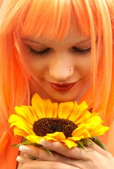 picture of lovely orange hair girl with sunflower