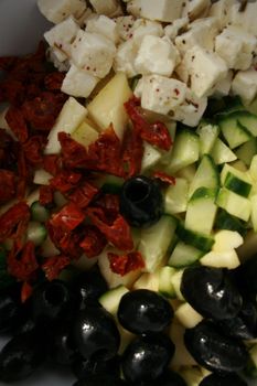 fruits and vegetables cut into a salad