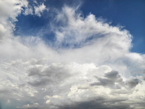 White clouds in blue sky.