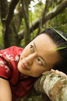 Portrait of Asian American woman in ethnic attire in Maui, Hawaii.