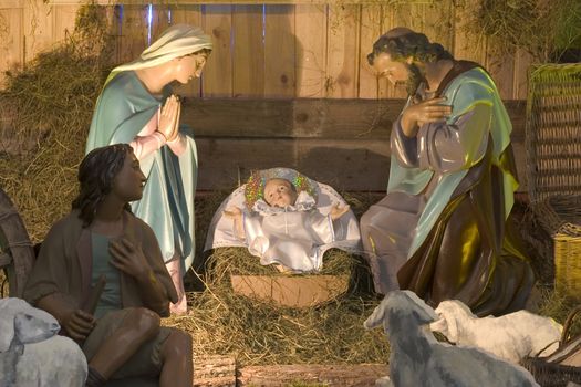 Day nursery with figures of baby Jesus, Maria and Joseph, the shepherd and animals